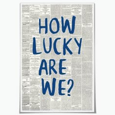 a newspaper with the words how lucky are we? written in blue ink on it