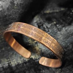 🕌 Personalized Muslim Copper Cuff: Embrace the elegance and spiritual significance of our beautifully crafted Ayetel Kursi Bracelet. This stunning Quran Bracelet is designed with a secure copper clasp, making it not only a stylish accessory but also a meaningful piece of Arabic Jewelry. 💫 Made from high-quality copper, this bracelet features an adjustable design to ensure a comfortable fit for any wrist size. The Secure Lock Bangle offers peace of mind, knowing your cherished piece is safely f Spiritual Copper Bangle Jewelry, Traditional Adjustable Copper Cuff Bracelet, Spiritual Copper Cuff Bracelet For Gift, Adjustable Copper Spiritual Cuff Bracelet, 100% Copper Braclet, Meaningful Beauty, Arabic Jewelry, Copper Cuff, Dainty Bracelets