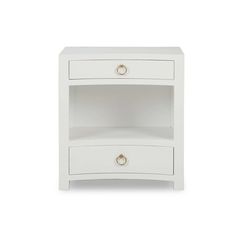 a white nightstand with two drawers and gold knobs on the bottom shelf, against a white background