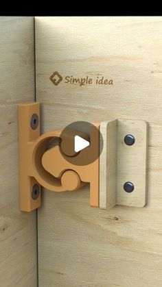 an image of a wooden door with the word simple idea on it and a video playing button