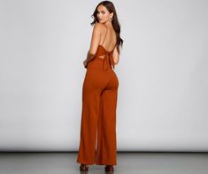 Keep your look sleek and stylish with a jumpsuit that stuns from day to night! The jumpsuit features a sleeveless square neckline. spaghetti straps. an open back with a chic tie-back accent. and a straight-leg fit. The jumpsuit is composed of a crepe fabric that offers a form-hugging fit with a moderate stretch. Complete look with mules.Fit & Features Sleeveless square neckline Spaghetti straps Open back. tie-back accent Straight leg fit Crepe fabric Form-hugging fit. moderate stretch Runs true Crepe Jumpsuit, Maxi Dress Pattern, Ribbed Mini Dress, Maxi Knit Dress, Silver Dress, Crepe Fabric, New Tops, Sweater Coats, Ladies Day