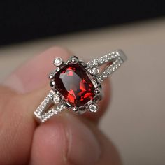 This is a gorgeous handmade creation. Its beauty is its simplicity & Elegance. The 6*8 mm cushion cut faceted natural Garnet is crafted in solid sterling silver and with rhodium plated. All item is sent in a beautiful gift box If you have any idea of design your ring,pls contact me directly. You can realize more lovely stuff clicking the link https://www.etsy.com/shop/knightjewelry?refshopsection_shophome_leftnav Please leave the correct address and you phone number for delivering successful Elegant Birthstone Ring With Gemstone Accents As Gift, Elegant Rings With Gemstone Accents For Gift, Elegant Gemstone Accented Rings For Gifts, Lab-created Ruby Rings With Accent Stones For Gift, Gift Rings With Lab-created Ruby And Accent Stones, Garnet Gemstone Accents Promise Ring, Elegant Ruby Ring With Gemstone Accents As Gift, Garnet Gemstone Promise Ring, Elegant Garnet Rings As A Gift