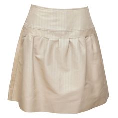 GUARANTEED AUTHENTIC VALENTINO BEIGE A-LINE PLEATED SKIRT Details: - Timeless A-line silk skirt in a khaki beige color. - Yoke waist. - Pleating. - Side zipper closure. - Unlined. Material: 80% Cotton, 20% Silk Size: 4 Measurements (Approximate laid flat, Alterations By Chanel): - Waist, 14.25" (higher waisted) - Hip, 18" - Total Length, 19" (tip of front waistline to bottom front hem) To Our Customers: - We consider it a privilege to serve as your luxury fashion concierge. Whether you are looki Formal A-line Silk Bottoms, Silk A-line Bottoms For Formal Occasions, Elegant A-line Pleated Skort, Spring Silk A-line Skirt, Elegant A-line Pleated Skirt For Daywear, Classic Fitted A-line Skirt, Classic A-line Skirt For Daywear, Silk A-line Skirt, Chic A-line Pleated Skort