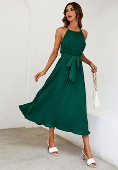 - Halter neck with adjustable straps- Pleated skirt- Elastic waist- Belted- Midi / long dress- Day dress- Evening dresses- Perfect for casual occasions- Wedding Guest- Party- Going Out- Occasion Model wears: UK 8/ EU 36/ US 4Model's height: 175cm/ 5'8'' 95% Polyester, 5% Spandex Elegant Green Halter Dress With Spaghetti Straps, Green Pleated A-line Maxi Dress, Green Pleated Dress With Spaghetti Straps, Green Pleated Beach Dress, Elegant Beach Dress With Pleated Bodice, Flowy Halter Neck Solid Dresses, Green Sleeveless Dress For Summer Wedding, Pleated Halter Neck Sundress, Green Sleeveless Summer Wedding Dress