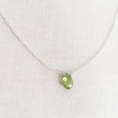 This is a peridot necklace made of genuine high quality faceted peridot. This is a August birthstone necklace. Peridot jewelry is light weight and elegant. This green peridot is around 1 carats. The green stone necklace is great for layering with other gold necklaces. I pay attention to detail and pick the best quality peridot gemstone to make this minimalist necklace. Enjoy free shipping: http://www.sforsparkle.com Measurement: 8 mm by 5 mm S for Sparkle on Etsy https://www.etsy.com/shop/sforsp Green Peridot Necklace For May Birthstone, Lime Green Peridot Necklace For May Birthstone, Green Peridot Gemstone Necklace, Green Peridot Pendant Necklace, Oval Green Peridot Necklaces, Oval Peridot Necklace For May Birthstone, Green Peridot Necklace For Gift, Lime Green Necklace For May Birthstone Gift, Lime Green Necklace Gift For May Birthstone