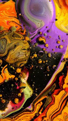 an abstract painting with lots of colors and bubbles on the surface, including black, yellow, purple, orange, and red