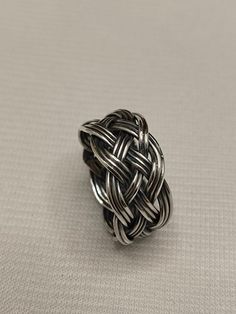 About item:- Hand Woven ring Tittle:- Hand Woven Braided Ring, Silver Ring, Statement Ring, Interlacing Endless Knot Ring, Celtic Rope Ring, Celtic Knot Ring, Handmade Jewelry, Men's Ring - Choose your size in the variation at check-out! - All rings comes in jewel bag. Benefits of wearing silver:- Wearing silver jewelry is proved in fighting infection and preventing yourself from cold and flu, and many kinds of bacteria and viruses. Silver helps expand blood vessels elastic. This condition makes it possible for the quick formation of bones and healing of the various parts of body from wound to bruises. Ring For Mother's Day Gift Ring For Father's Day Gift Ring For Promise Ring For Valentine' Day Ring For Halloween Party Ring For Christmas Day Gift Ring For New Year Party Black Friday Ring Endless Knot, Jeweled Bag, Halloween Ring, Rope Ring, Woven Ring, Rope Rings, Celtic Knot Ring, Mom Ring, Braided Ring