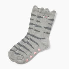 Calling all cat lovers!  Feel the cozy comfort of our super-soft cat crew socks.  Each sock has cute little ears, a sweet embroidered face, and silicone paw prints to help steady your step.  Perfect for lounging, warming your toes, and showing your playful side. Cute Winter Socks With Cat Design, Cute Cat Design Socks For Winter, Cute Cat Design Winter Socks, Cute Super Soft Indoor Socks, Cute Super Soft Socks For Indoor, Paws Socks, Embroidered Face, Grey Cat, Fuzzy Socks