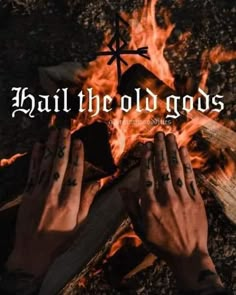 two hands over a campfire with the words hail the old gods on it