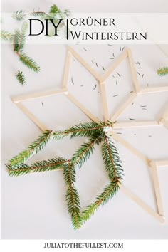 popsicle christmas tree ornament made out of popsicles and pine branches with text overlay