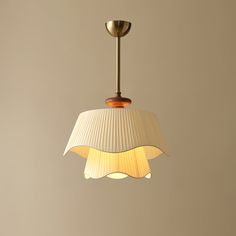 The Bellevue Pendant Lamp brings a touch of French countryside charm to any room. Its double-layer wavy lampshade design, paired with warm off-white fabric, creates a soft and inviting glow. Elegant and romantic, this lamp is perfect for adding a cozy atmosphere to any space. If you have any questions about our products, please get in touch with us and we will reply to you within 24 hours. Product Size Size: Dia 25cm x H 34cm / ∅ 9.8″ x H 13.4″ Size: Dia 50cm x H 35cm / ∅ 19.7″ x H 13.8″ Size: D Wavy Lampshade, Tiffany Style Table Lamps, Chandelier Art, Dining Room Pendant, Lampshade Designs, Large Pendant Lighting, Pendant Lighting Dining Room, Ceiling Lamp Shades, Farmhouse Chandelier