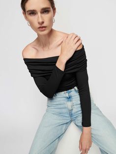 Feel fancy (without any of the effort). This fold-over off the shoulder top has an easy, draped fit for a perfectly undone vibe. (This one comes in Jet Black.) | Women's Abana Off Shoulder Top in Jet Black | Ethical Essentials Chic Ruched Off-shoulder Long Sleeve Top, Chic Off-shoulder Fitted Crop Top, Chic Long Sleeve Ruched Off-shoulder Top, Fitted Off-shoulder Foldover Top For Party, Ruched Off-shoulder Blouse For Night Out, Off-shoulder Ruched Blouse For Night Out, Chic One Shoulder Foldover Top, Chic Ruched Off-shoulder Top For Night Out, Stretch Draped Tops