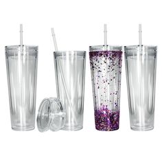 three different tumblers with straws and lids