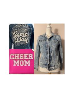 a blue jean jacket sitting on top of a mannequin's head next to a pink sign that says game day cheer mom