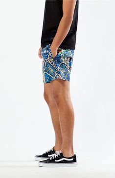 Add some colorful style to your weekend with the Modelo 5" Swim Trunks. Featuring an elastic stretch waistline and a festive pattern throughout, these swim shorts are perfect for adding flair to your poolside look.


	Elastic stretch waistline
	Side pockets
	Standard fit
	Single back pocket with drainage hole
	Mesh lining
	Custom pattern
	5" Inseam
	15" Outseam
	Model is wearing size medium
	Model Measurements: 6’2” Height, 29.5” Waist, 32” Inseam Colorful Style, Colorful Fashion, Swim Trunks, Swim Shorts, Pacsun, Swimming, Mesh, Elastic, Size Medium