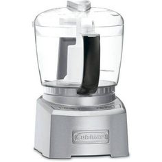 a silver blender sitting on top of a white table