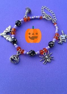 Halloween Charm Bracelet Autumn Charm Bracelet Halloween Fall Jewelry Pumpkin Charm Spider Charm Witch Charm Bat Charm Ghost Charm Bracelet by KeyStarDesigns on Etsy Novelty Silver Halloween Bracelet, Silver Halloween Novelty Bracelet, Novelty Silver Bracelet For Halloween, Halloween Party Beaded Bracelets, Halloween Novelty Orange Bracelets, Halloween Gift Charm Bracelet, Novelty Orange Bracelets For Halloween, Spooky Halloween Bracelets For Gift, Spooky Halloween Gift Bracelets