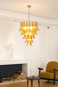 Indulge in luxury and artistry with our Murano Chandelier. Made in Italy, this exquisite piece features the finest glass and intricate design that adds timeless elegance to any space. With exceptional craftsmanship, it brings sophistication to your home. Elevate your decor with this true representation of fine craftsmanship.