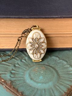 For yourself or someone you love... Timeless and classic, this gorgeous Antique brass filigree locket will become a special addition to your jewelry collection. The locket opens to the side to reveal 4 places, Glue on photos or keep a secret note locked away, close to your heart. SIZE: Oval locket: approx 32mmx20mm You can select a LENGTH you like! I also have another vintage silver locket with dragonfly here: https://www.etsy.com/listing/173498129/ Happy customers said this: AMAZING! The photo Victorian Filigree Necklace For Keepsake, Vintage Charm Oval Locket Necklace, Victorian Locket Necklace For Gift, Victorian Locket Necklace As A Gift, Victorian Locket Necklaces For Gifts, Vintage Handmade Oval Locket Necklace, Elegant Oval Pendant Locket Necklace For Vintage Collection, Handmade Vintage Oval Pendant Locket Necklace, Elegant Oval Pendant Locket Necklace From Vintage Collection