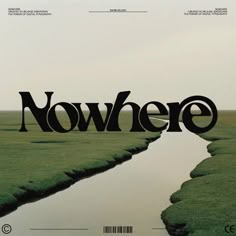 there is a poster with the word nowhere on it and water in the foreground