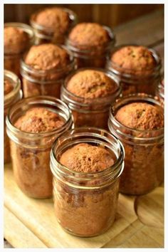 several jars filled with different kinds of food