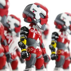 a group of robot figurines standing next to each other