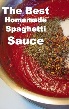 the best homemade spaghetti sauce is in a bowl with spices and seasonings on top