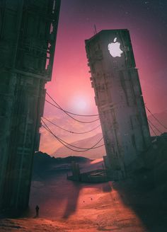 an apple logo is seen on the side of a building at sunset in this artistic photo