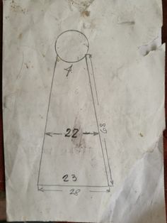 an old piece of paper with a drawing of a tower on it's side