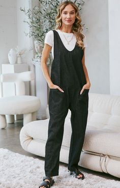 EASY DENIM JUMPSUIT. SLOUCHY RELAXED PULL-ON-STYLE. OVERSIZED PATCH POCKETS, DROP-CROTCH HAREM STYLE LEGS. ADJUSTABLE SHOULDER STRAPS EASY EVERYDAY TROWN ON WITH YOUR FAVORITE GRAPHIC TEE AND SNEAKERS FOR A CASUAL DAY LOOK.*DETAIL*-RELAXED FIT-HAREM LEGS-DROP-CROTCH HAREM-LOW SCOOP NECKLINE-LOW BACK WITH ADJUSTABLE SHOULDER STRAPS-PULL-ON-STYLE-OVERSIZED PATCH POCKETS-CASUAL DAY LOOK-DENIM JUMPSUIT-IMPORT 100% Cotton Overall Jumpsuit, Day Dreamer, Denim Jumpsuit, Ladies Boutique, Scoop Neckline, Vintage Black, The Dreamers, Shoulder Straps, Graphic Tee