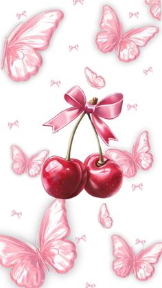 two cherries with pink butterflies flying around them