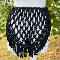 Macrame Festival Shorts - a perfect choice for Tomorrowland and beach party extravaganzas. This black boho-style shorts ensemble is your go-to for a fashionable birthday outfit, ensuring you stand out with style at every celebration. Information: * Material: polyester cord. * Color: black - ready to ship.  * Size: s-m. * Handmade by myself in Lithuania, Europe. * Size s-m in black is ready to ship. For other sizes or other colors - please contact me by messages here on Etsy.  Care recommendations: hand-wash only with soup, no tumble dry, lay the garment out to dry on the flat surface, like a sofa, table or countertop. Shipping: ready to ship item will be dispatched in 1-3 business days. Made to order items may take additional 3-7 business depending on cord availability and your request det Bohemian Beach Shorts For Summer, Bohemian Shorts For Summer Beach Party, Bohemian Style Shorts For Beach Party, Bohemian Style Short Bottoms For Beach Party, Beachwear Bottoms With Built-in Shorts For Festival, Bohemian Beach Shorts For Beach Season, Bohemian Shorts For Beach Party In Spring, Bohemian Style Shorts For Beach Party In Spring, Black Summer Bottoms For Beach Party