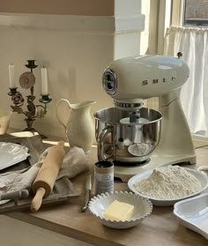 the kitchen counter is cluttered with ingredients for making cookies and cream cheesecakes