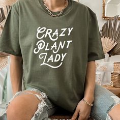 Crazy Plant Lady Sweatshirt , Plant Mom Sweat , Plant Lover Gifts ,Plant Lover Shirt , Gardening Gift , Plant Lady Sweat, Garden Shirt ORDERING: 1. Review all photos 2. Choose Size and Color from drop-down menu 3. If personalization box is available, add your text color 4. Add each shirt to cart one at a time 5. Click "Add to Cart" - you can go back to add more products 6. Click "Proceed to Checkout" 7. Add note to seller for any requests BULK DISCOUNTS AND SPECIAL REQUESTS: We offer bulk discou Plant Lover Gifts, Garden Shirt, Crazy Plant Lady, Gardening Gift, Gardening Shirts, Plant Lover Gift, Plant Mom, One At A Time, Plant Lady