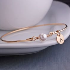 Gold Bangle Bracelet  White Pearl Bracelet by georgiedesigns Classic Rose Gold Pearl Bracelet Gift, Classic Rose Gold Pearl Bracelet As Gift, Elegant Personalized Adjustable Pearl Bracelet, Elegant Personalized Round Pearl Bracelet, Elegant Adjustable Personalized Pearl Bracelet, Elegant Personalized Gift Bracelets, Elegant Round Bracelets For Personalized Gift, Elegant Bangle Bracelet For Personalized Gift, Elegant Charm Bracelet For Personalized Gift