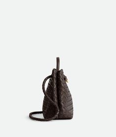 Find BOTTEGA VENETA Intrecciato Leather Top Handle Bag on Editorialist. The Bottega Veneta Intrecciato Leather Top Handle Bag features a sliding cross-body strap. The interior is compartmented with one zippered pocket and two open pockets. It has a magnetic closure, a lambskin bonded Intrecciato lining, and brass finish hardware. Dimensions: Height: 25 cm | 9.8”. Width: 32 cm | 12.6”. Depth: 11 cm | 4.3”. Handle drop: 9 cm | 3.5”. Strap drop: 45 cm | 17.7”. It is crafted from lambskin. Bottega Veneta Intrecciato, Eyewear Womens, Big Bags, Medium Bags, Handle Bag, Nappa Leather, Leather Top, Magnetic Closure, Brass Finish