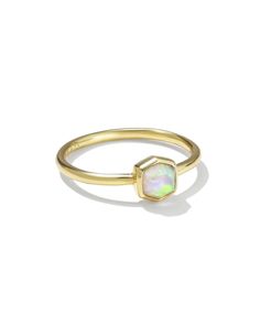 You can’t go wrong with the Davie 18k Gold Vermeil Band Ring in White Kyocera Opal. Our signature icon reimagined in a modern, minimalist design made to wear every day. Metal 18k Yellow Gold Vermeil What is Vermeil? Vermeil (that’s pronounced ver-may) is a gold plating technique that dates back to the 19th century. While other jewelers plate over less durable metals, our vermeil starts with a Sterling Silver base and is plated with just over 2.5 microns of 18k Gold to create a more timeless piec Opal Solitaire Ring, Engagement Rings Sale, Bar Jewelry, Sports Jewelry, Modern Minimalist Design, Initial Jewelry, Demi Fine Jewelry, New Jewelry, Kendra Scott Jewelry