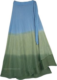 Costa de Sol Wrap Around Beach Skirt - A great skirt for some coolness in the sun; this skirt is an amazing choice to wear to the beach this summer. The skirt`s fabric is dyed in green and blue, the entire fall of the skirt is full with a graceful side wrap. Made of 100% cotton, its long flowy fabric will keep you comfortable, no matter how warm it gets all season long. You can wear this skirt with a plain solid tank top for casual days, and with an embroidered one for an evening party. Pair it Green Flowy Cotton Skirt, Flowy Green Maxi Skirt For Summer, Green Pleated Skirt For Summer, Green Cotton Casual Maxi Skirt, Green Flowy Summer Skirt, Casual Blue Wrap Skirt For Beach, Green Cotton Maxi Skirt With Relaxed Fit, Green Skirt Bottoms For Summer, Casual Blue Wrap Skirt For The Beach