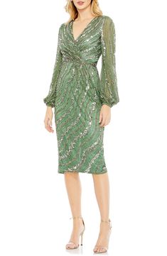 Swirls of sequins animate this elegant cocktail dress, rendered in a verdant hue and styled with a gracefully draped bodice. Surplice V-neck Long sleeves Lined, except sleeves 100% polyester Spot clean Imported Asian Owned/Founded Cocktail Dress Ideas, Mesh Cocktail Dress, Casual Beach Wedding, Mom Wedding Dress, Dress Sparkle, Tea Length Skirt, Mother Of The Groom Dress, Disco Glam, Best Wedding Guest Dresses