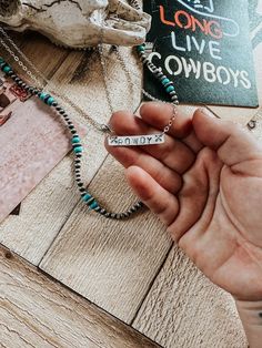 Hand-stamped silver bar western inspired metal necklace for all us modern day cowgirls ⚡️These are hand-stamped and packaged by The Bevel Label. Due to each necklace being hand-stamped, the spacing and color may vary slightly from pictures. Measures 1 1/2" x 1/4" and made out of 14g metal. The aluminum will not rust or turn your skin green. I use a heavy-duty permanent black ink to make the design stand out, but any water or chemicals can cause that to fade away after time, so avoid getting wate Making Western Jewelry, Stamped Jewelry Ideas Western, Stamped Jewelry Ideas, Stamp Necklace, Rodeo Jewelry, Cowgirl Gifts, Stamped Necklaces, Western Boutique, Silver Bar Necklace