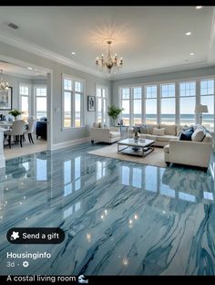 a living room filled with furniture and a chandelier hanging from the ceiling over a marble floor