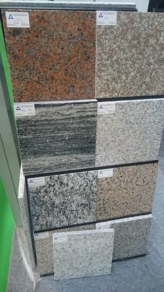 several different types of granite on display in a store