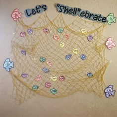 there is a net with fish on it and words that say let's shellfish