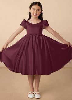 Juno is our sweet and classy matte satin dress. She features adorable puff sleeves, a sweetheart neckline, a A-line skirt, and a beautiful bow at the back of the dress. Satin Dress With Pleated Bodice And Sweetheart Neckline, Solid Dress With Pleated Bodice And Sweetheart Neckline, Solid Dress With Fitted Bodice And Sweetheart Neckline, Solid Dress With Sweetheart Neckline And Fitted Bodice, Wedding Dress With Satin Bow And Sweetheart Neckline, Satin Dresses With Sweetheart Neckline And Bow Tie Back, Satin Empire Waist Dress With Fitted Bodice, Satin Dress With Fitted Bodice And Short Sleeves, Satin Short Sleeve Dress With Fitted Bodice