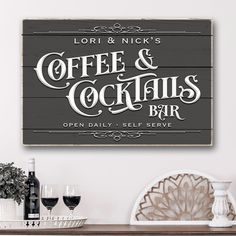 This custom canvas Coffee & Cocktails Bar sign displays art that looks like wood with gentle grain and plank lines. The canvas art mimics raised letters with shadows (but the canvas has a flat face). The design features details like a wooden sign but with all the advantages of a custom artist canvas - lightweight, effortless to hang and easy to wipe clean. - Beautiful premium canvas wrap - Patented solid-front construction prevents sagging and stretching over time - Clean corners and finished ba Diy Bar Sign Ideas, Coffee And Cocktails Sign, Coffee And Cocktail Bar Ideas, Letters With Shadows, Wine Bar Sign, Cocktail Station, Cocktail Decoration, Alcohol Bar, Sideboard Decor