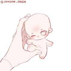 a drawing of a baby being held by someone's hand