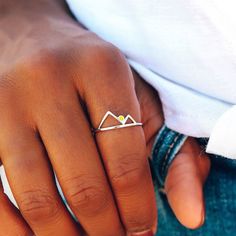 Stackable style ring with an enamel yellow sun rising over a cutout mountain design with a silver hammered band. Sunrise Ring, Nice Necklaces, Outdoor Look, Jewelry Hacks, Mountain Ring, Purity Ring, Mountain Jewelry, Sun Rising, Mountain Design