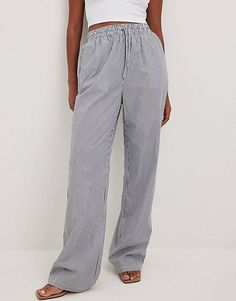 NA-KD striped drawstring pants in navy  | ASOS Casual Pinstripe Bottoms With Pockets, Casual Wide Leg Pants With Vertical Stripes, Casual Pinstripe Relaxed Fit Pants, Casual Pinstripe Pants With Relaxed Fit, Pinstripe Wide Leg Bottoms With Relaxed Fit, Casual Wide Leg Bottoms With Vertical Stripes, Spring Pinstripe Bottoms With Elastic Waistband, Pinstripe Wide-leg Bottoms With Relaxed Fit, Pinstripe Wide Leg Pants With Relaxed Fit