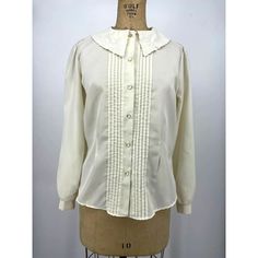 "Ann Chabrol Blouse Shirt Ivory White Pointed Flat Collar  Medium Embroidered Pointed Flat Collar Tuxedo Pleat Front Button Up Long Sleeve Button Cuffs Retro Modest Style 100% Polyester Measurements Chest 42\" Waist 39\" Length 24.5\"" Pointed Flat Collar, Modest Style, Flat Collar, Button Up Long Sleeve, Blouse Shirt, Collar Blouse, Vintage Shop, Ivory White, Vintage Shirts