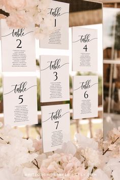 the seating cards were placed on top of each other in order to match the table numbers